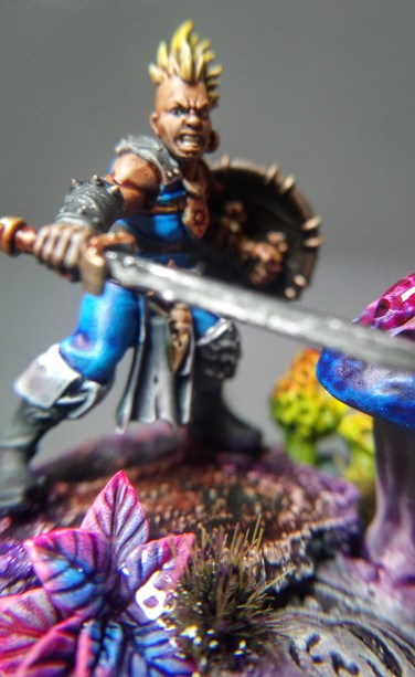 Extreme macro zoom on a Darkoath Barbarian miniature. It looks very dynamic. 